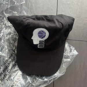 Port Authority Black Hat with Purple Design